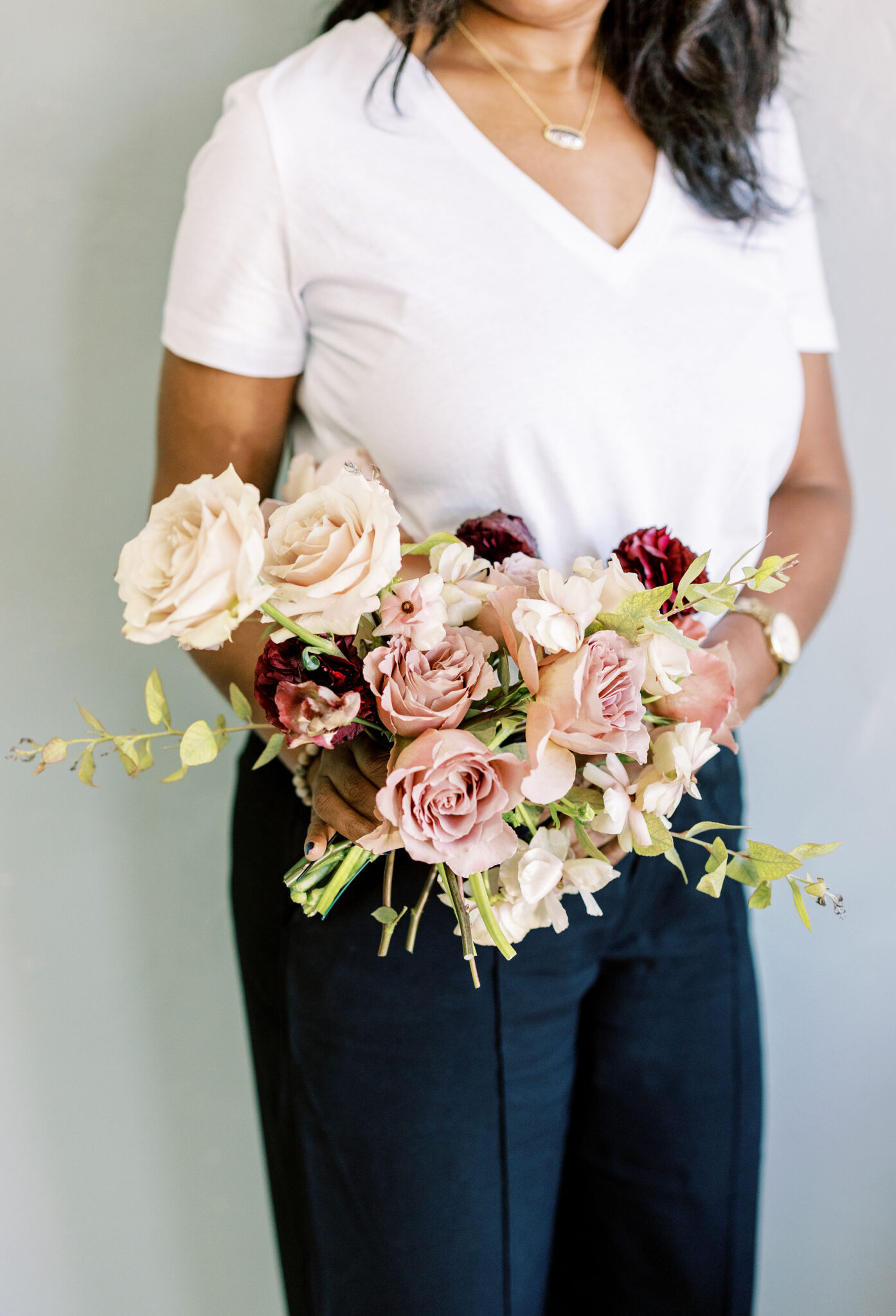 blush plum cream bouquet_meadows events peach, pink and coral bridal bouquet