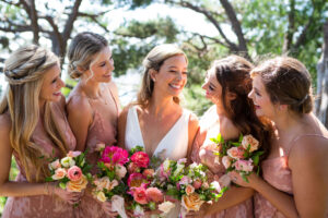 bride's bridesmaid flowers coral and peach