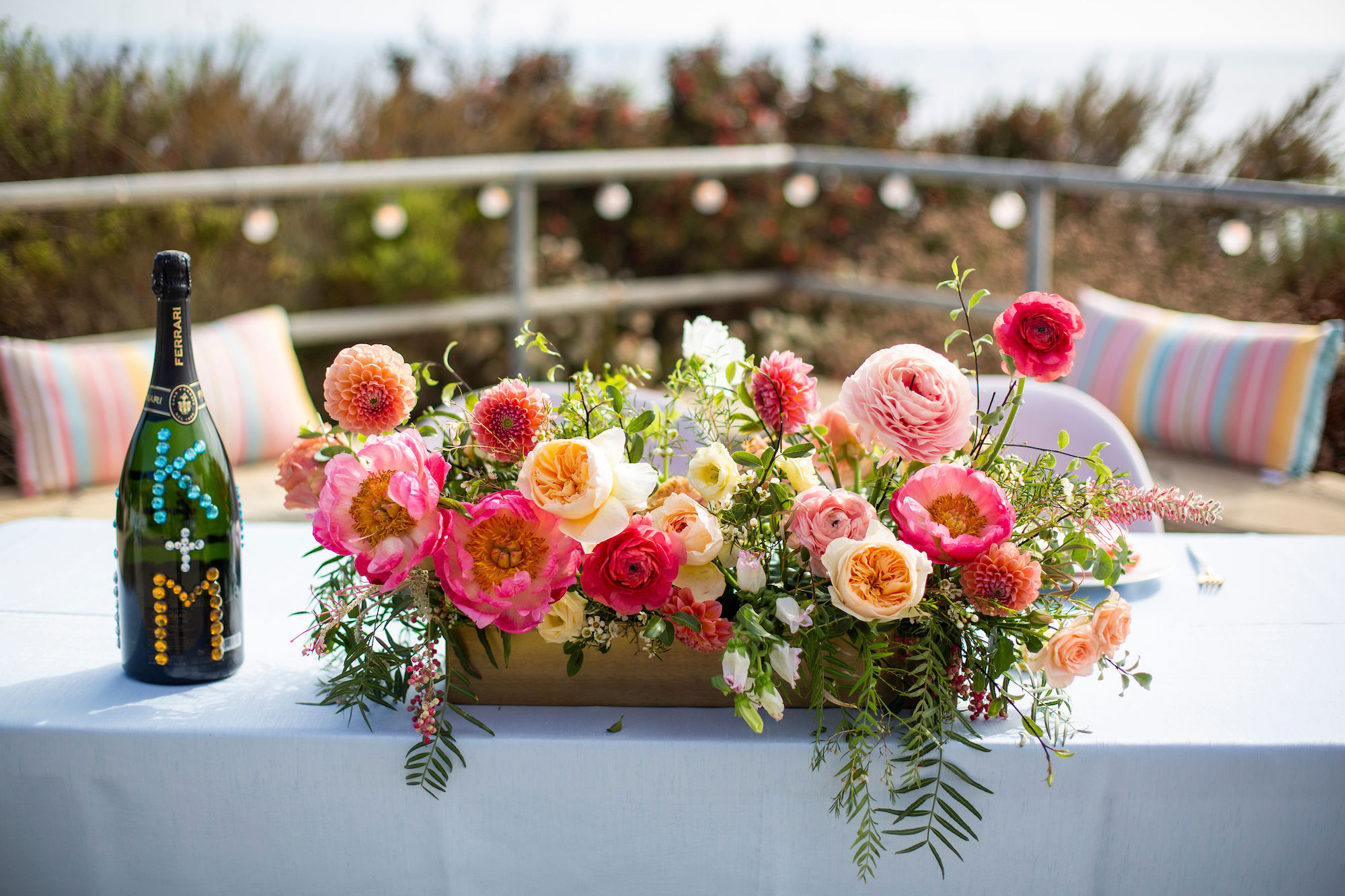 JANICE & KYLE coral and peach sweetheart table arrangement