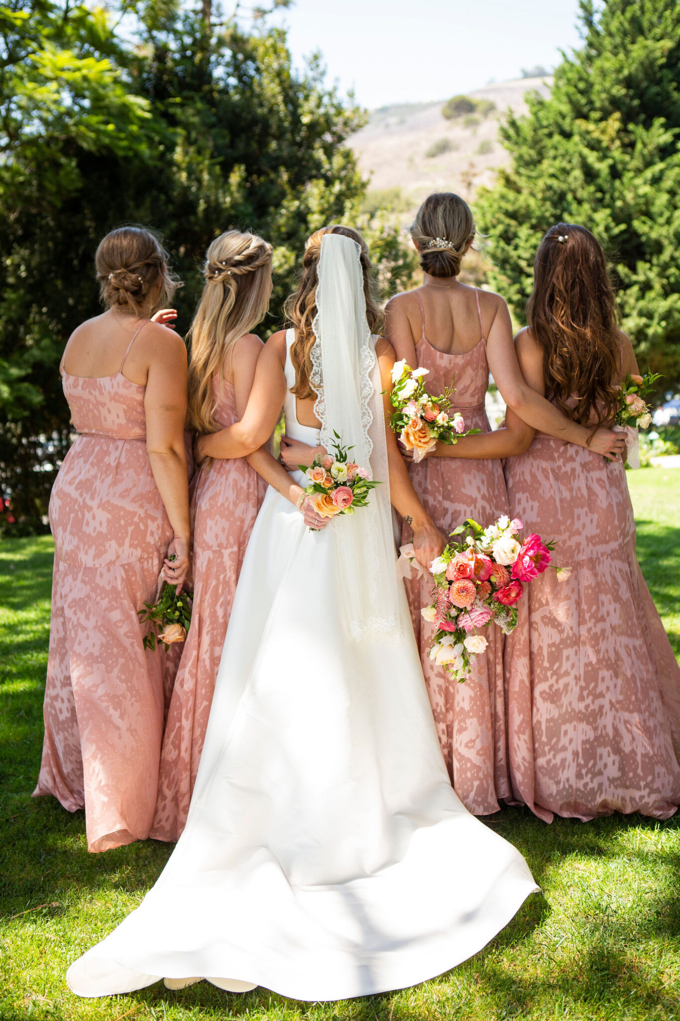 white flower bouquet_Spring california wedding coral and peach bridesmaids flowers